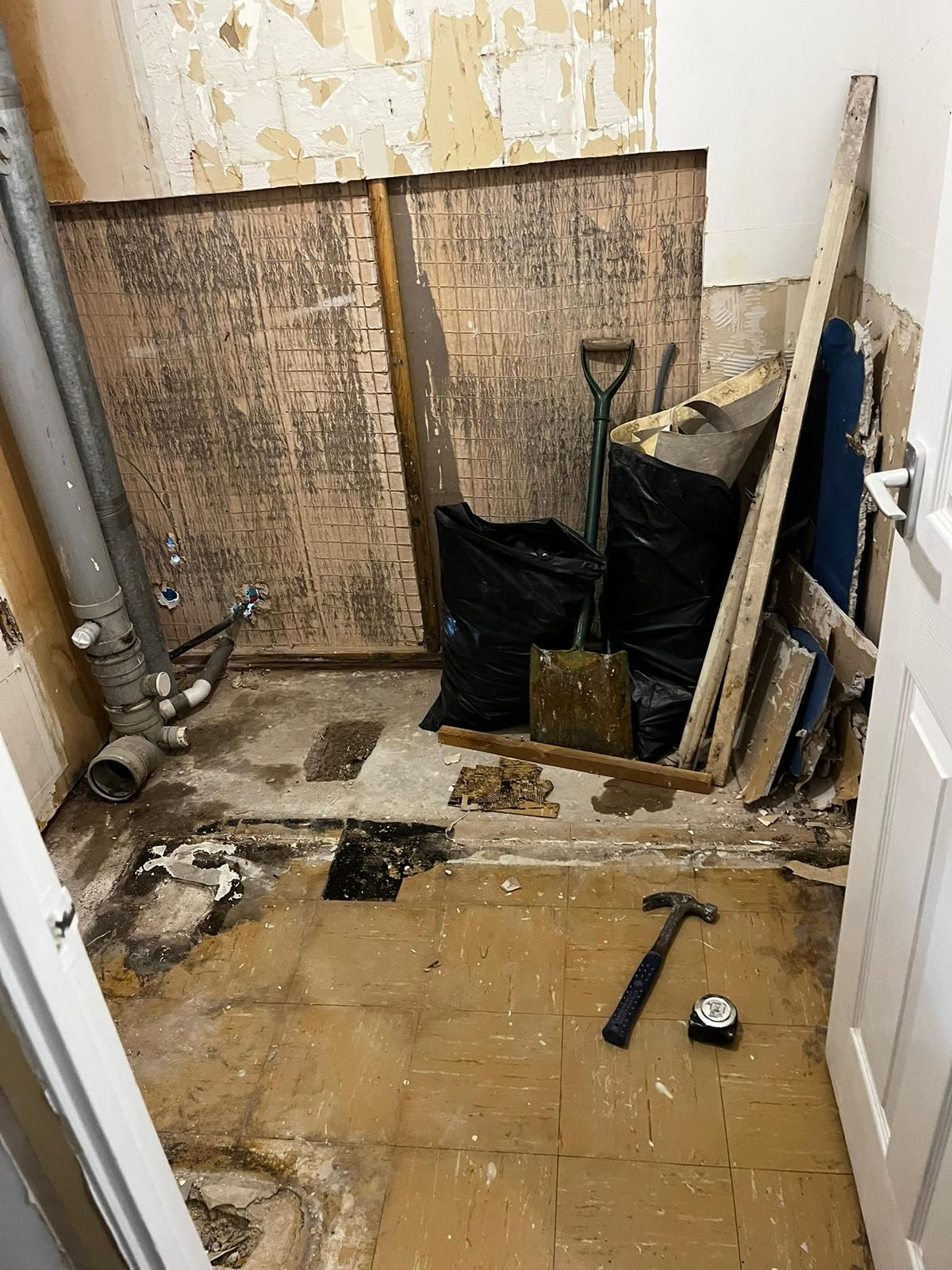 Bathroom stripped back to brick during ripout