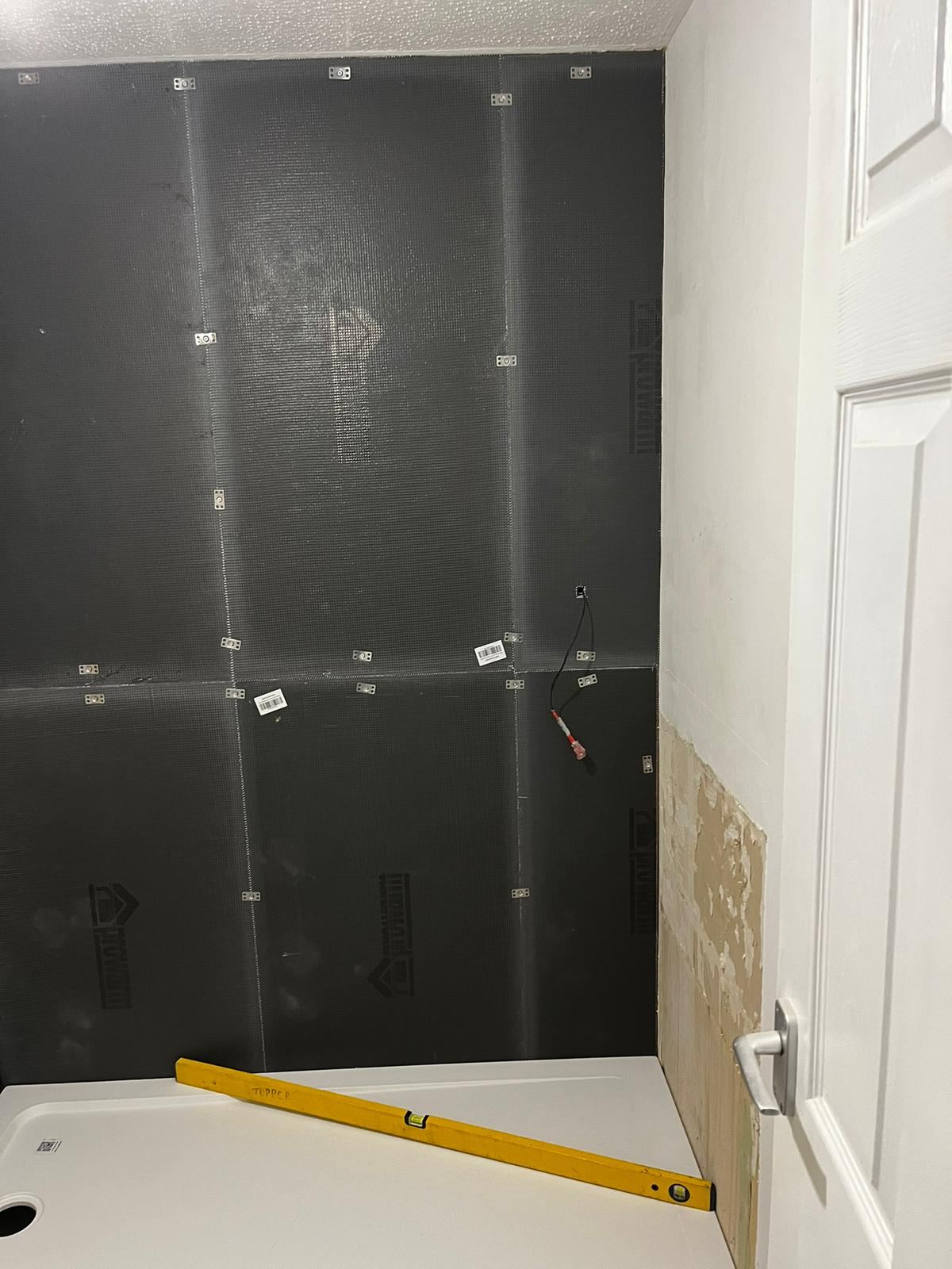 Waterproof tanking boards and new shower tray installed