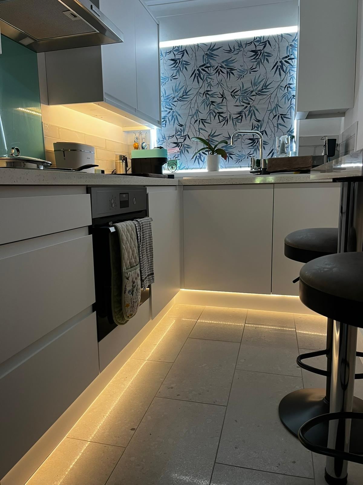 Finished kitchen refit with under-cabinet lighting by Black Dog Property Maintenance